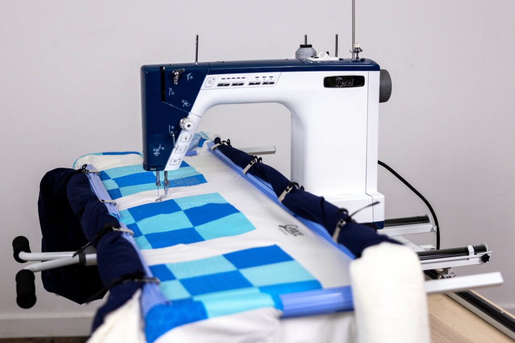 Achieve professional quilting results with Grace Company Little Rebel Machine