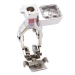 Order BERNINA #14D Zipper Foot with Guide enhance your sewing projects Professional sewing with BERNINA #14D Zipper Foot with Guide now online