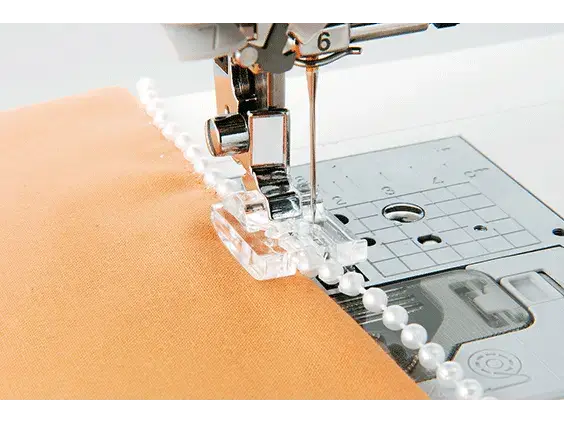 Brother 7mm Pearls and Sequins Foot for creating intricate embellishments on fabric edges