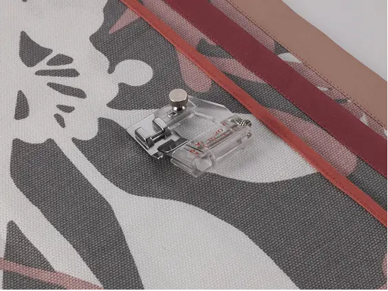 Brother Adjustable Binder Foot for creating neat and durable fabric bindings quickly