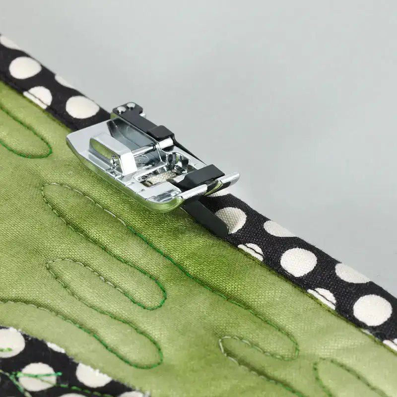 Brother Stitch in the Ditch Foot for precise stitch formation in quilting projects