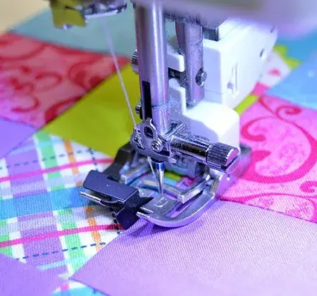 Janome AcuFeed Ditch Quilting Foot 9mm for making perfect ditch quilting stitches every time