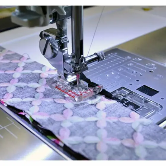 Janome Clear View ¼” Seam Foot 9mm for quick and clean stitching of fabric seams