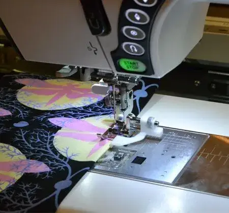 Janome Edge Guide Foot 9mm for easy stitch placement when sewing along fabric edges