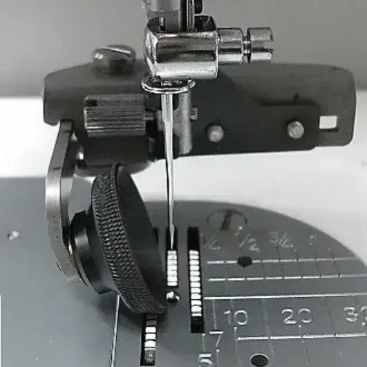 Janome HD Roller Foot for creating smooth stitch feeding on bulkier fabrics