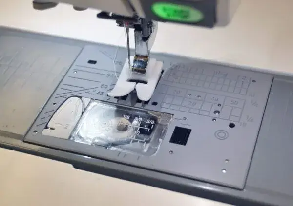 Janome Superior Ultra Glide Foot 9mm for enhancing sewing experience with smooth fabric movement