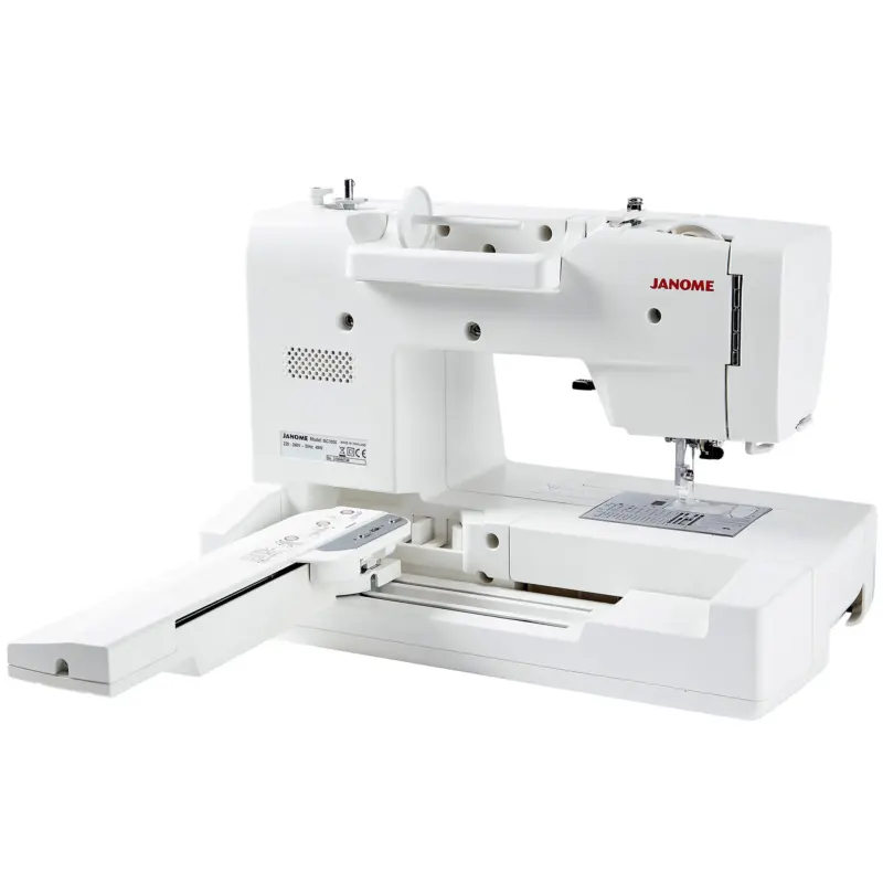 Janome Memory Craft 1000 sewing and embroidery machine includes multiple presser feet