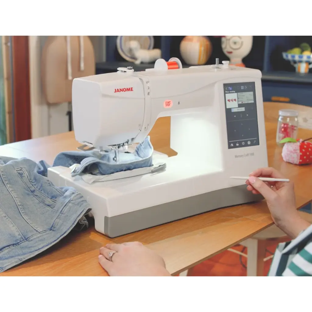 Janome Memory Craft 100E embroidery machine with user friendly controls