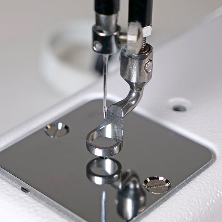 Handi Quilter Moxie longarm machine includes reliable needle positioning system