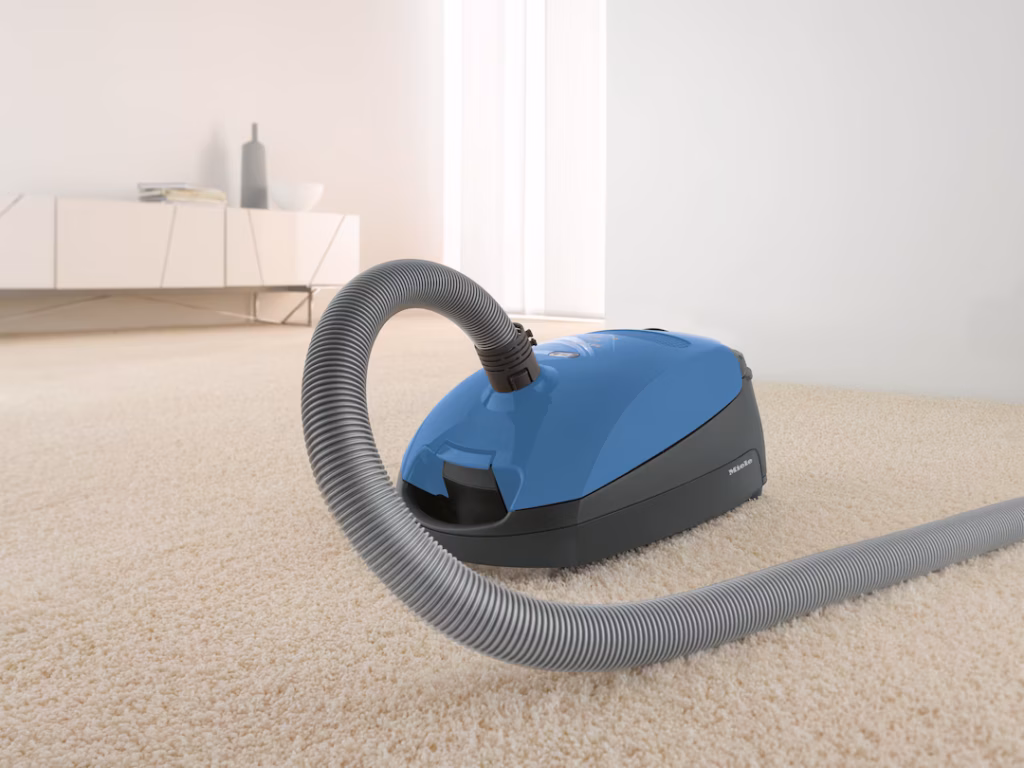 Miele Classic C1 Turbo Team PowerLine includes durable vacuum hose assembly